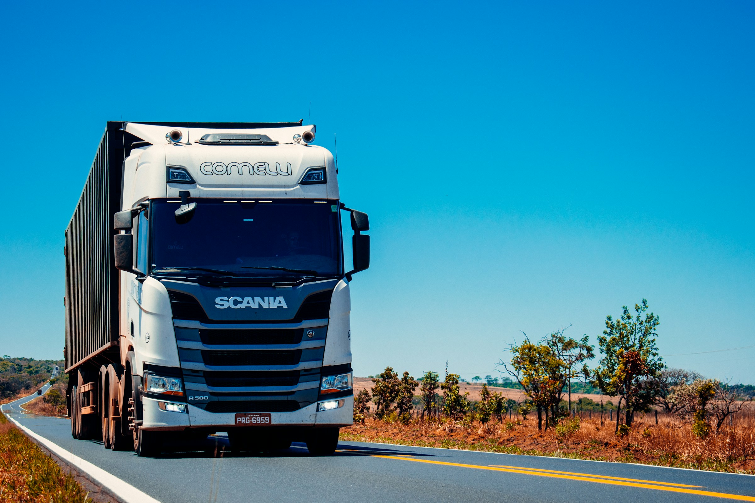 Semi truck hauling freight on a highway